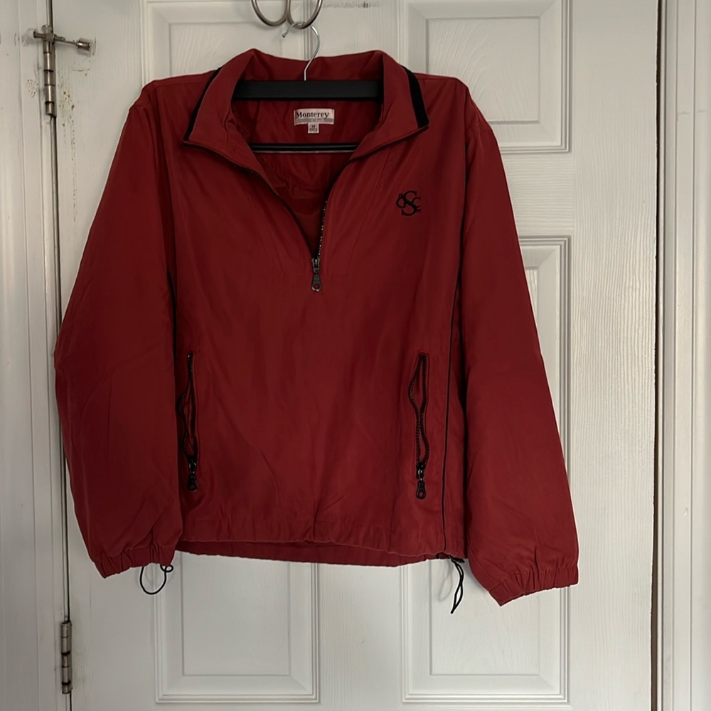 Monterey vintage windbreaker nice velvet type of feel on the outter side.